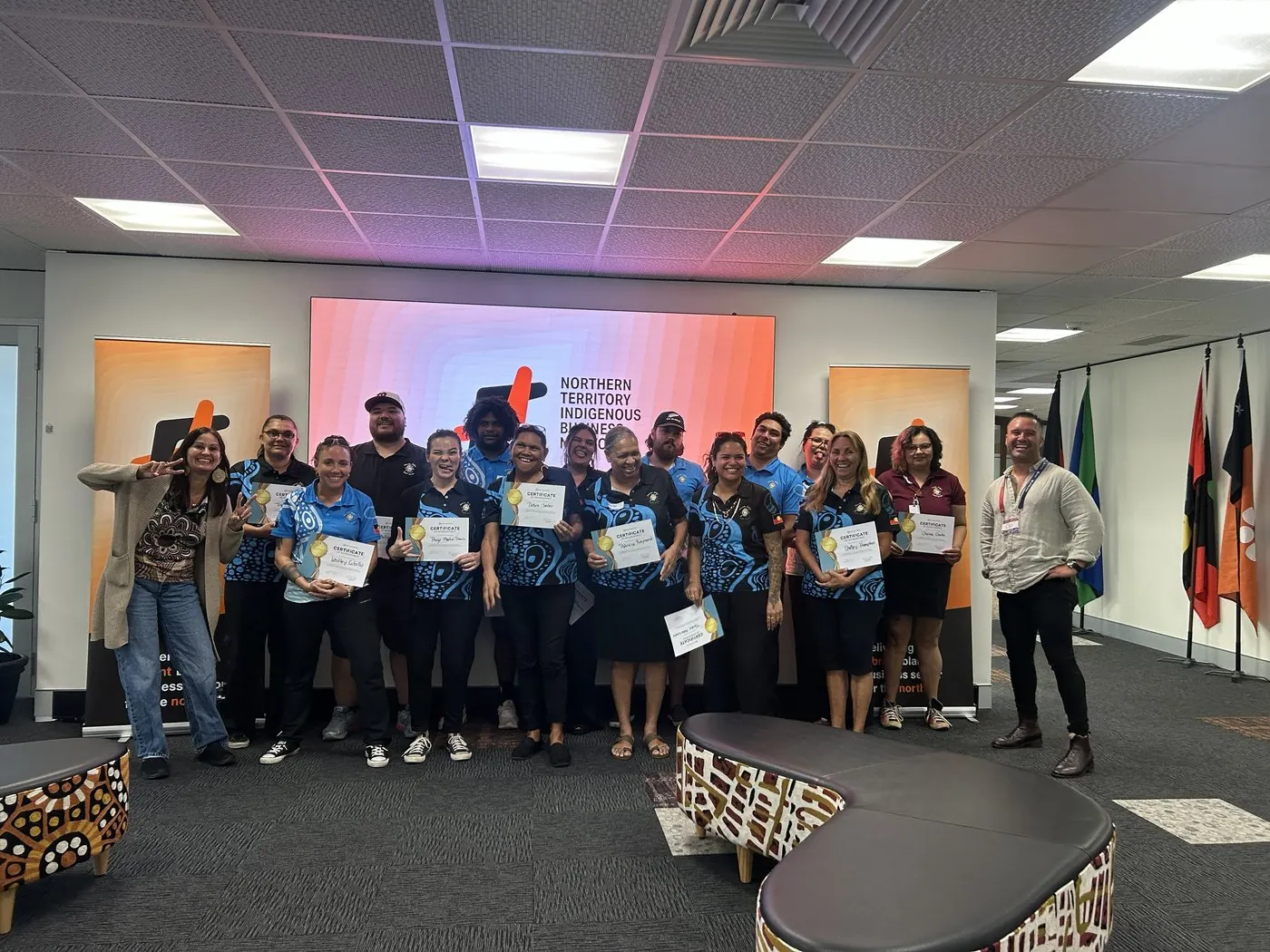 I-SPOT graduates holding their certificates of achievement in the Northern Territory